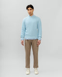 THE CABLE-KNIT CREWNECK