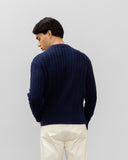 THE CABLE-KNIT CREWNECK